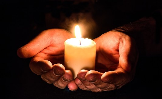 candle-in-hand-pixabay